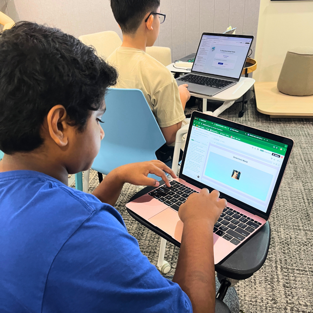 Child coding on a laptop